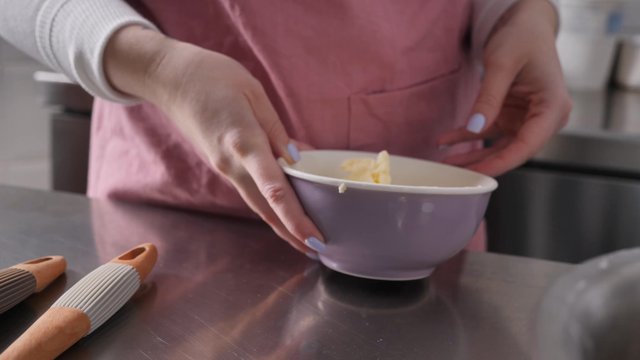 Woman putting ingredients on the table