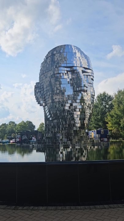 Metalmorphosis - Giant Head - Metalmorphosis rotating sculpture - Landmarks & Historical Buildings Near Me - Charlotte, North Carolina