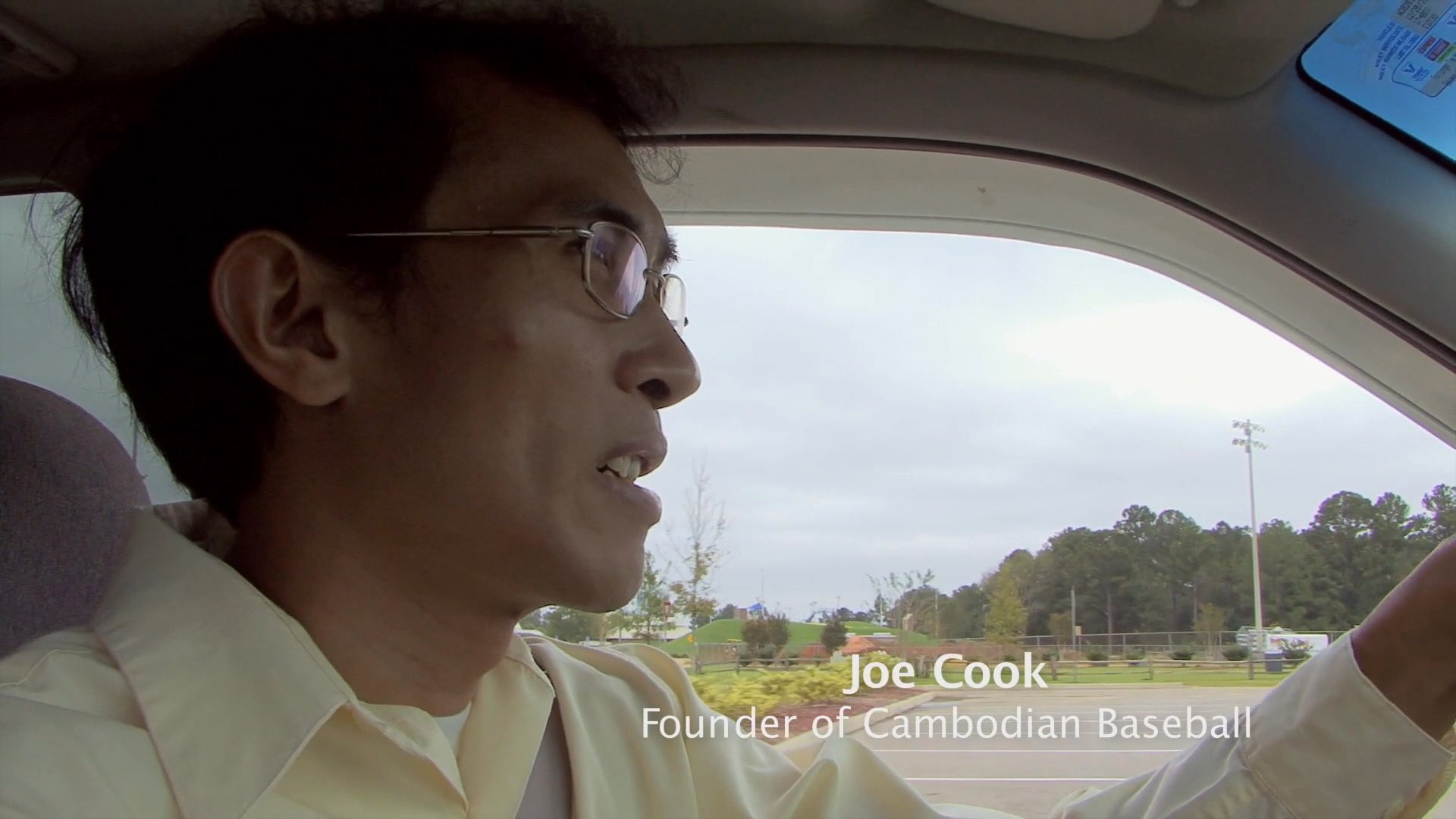 Joe Cook, founder of Cambodian Baseball, discusses his initiatives while driving before arriving at Mikata Japanese Steakhouse.
