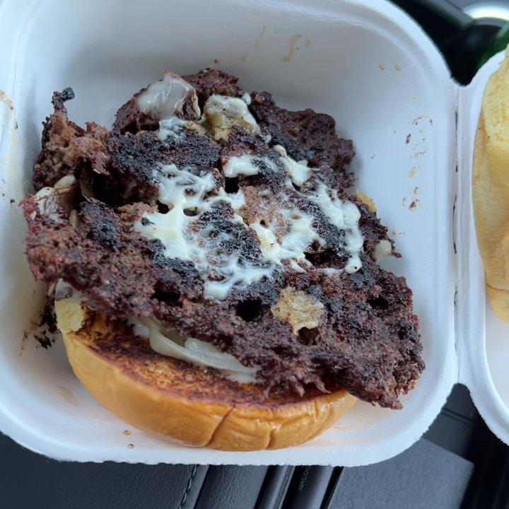 LA Burger - Burger is pretty burned on one side and falling apart. - Burgers Near Me - Carrollton, Texas