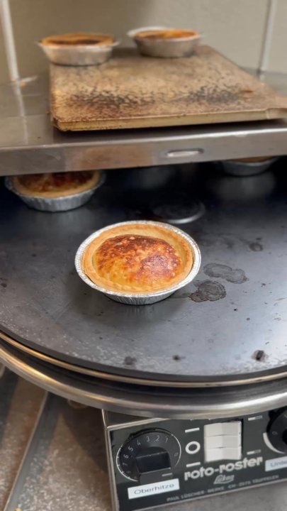 Chäs Barmettler - Follow your nose to the lil cheese tarts cooking on the spinning oven on the corner!   Grab a lil bottle of wine to complete your snack! - Food Near Me - Luzern, LU