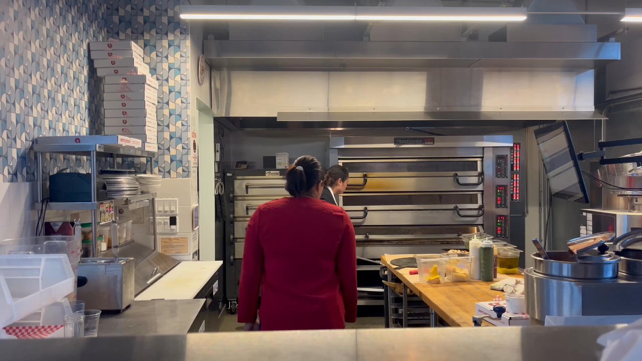 Acre Pizza - Claudia cooking the pies just right - Pizza Near Me - Sebastopol, California