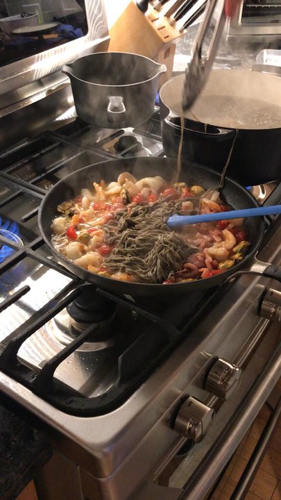 Cozymeal - Final step in creating our perfect seafood pasta. - Cooking Classes Near Me - Tampa, Florida
