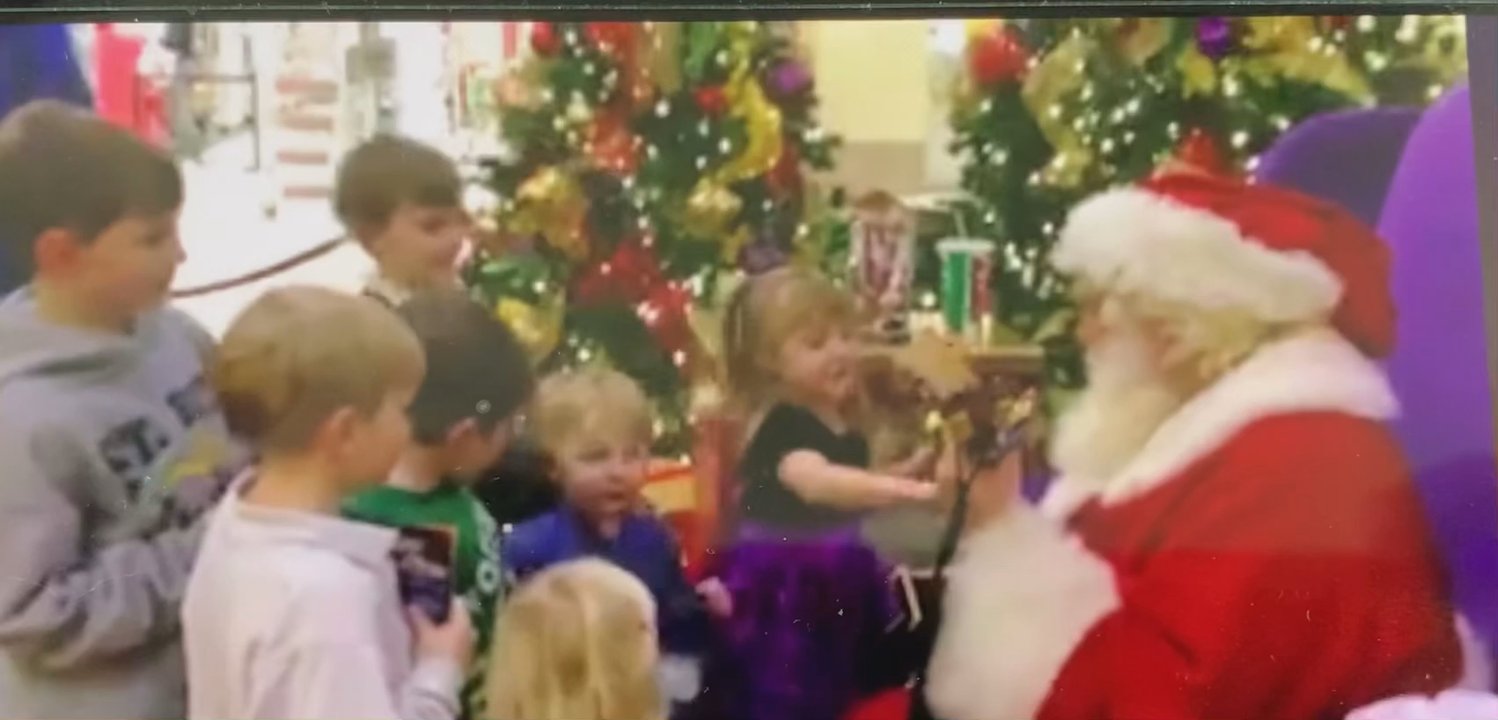 Santa's Workshop - 2014 Santa singing jingle bells to my daughters, nephews and niece. (They all still talk about this moment to this day) - Holiday Decorations Near Me