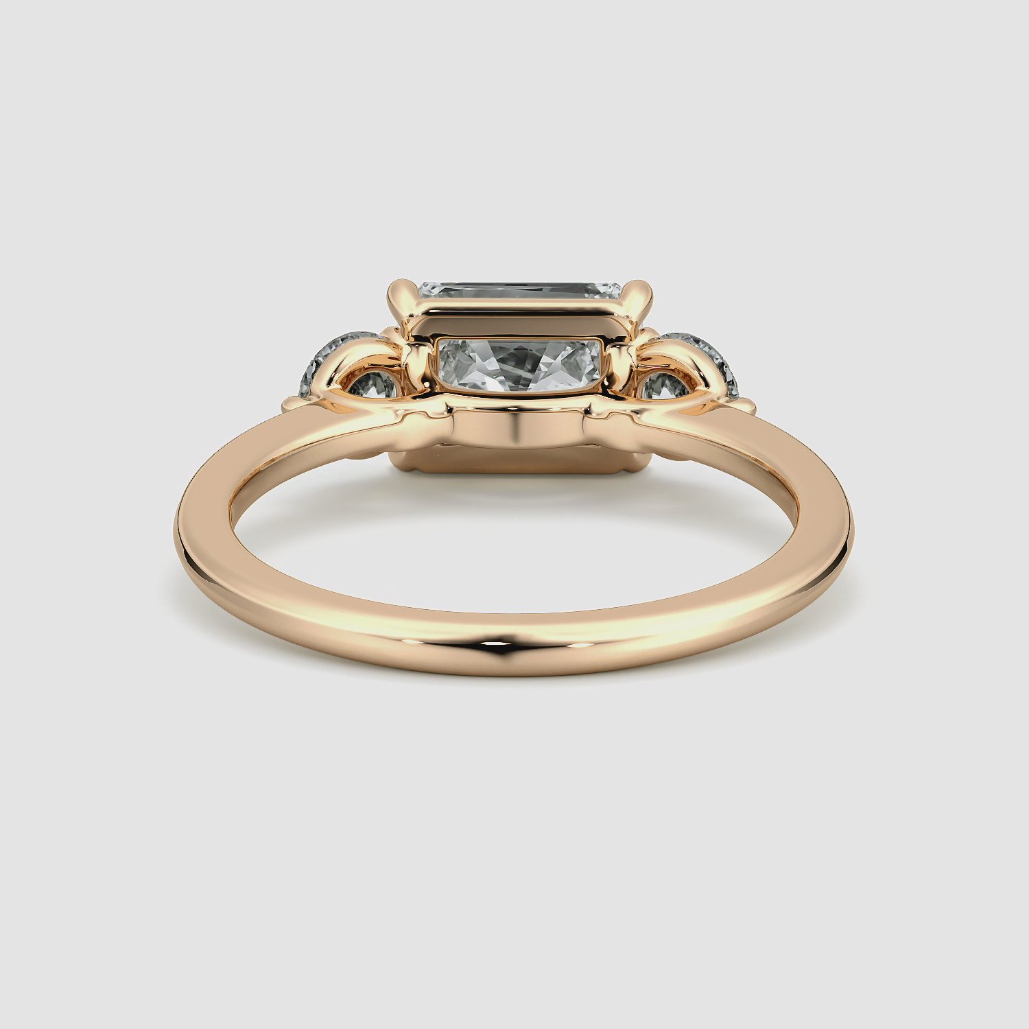 The Three Stone | Radiant | 14k | Rose Gold | bandAccent: Plain | diamondOrientation: horizontal | sideStoneCarat: 0.25ct | sideStoneShape: Round Brilliant | caratWeight: other