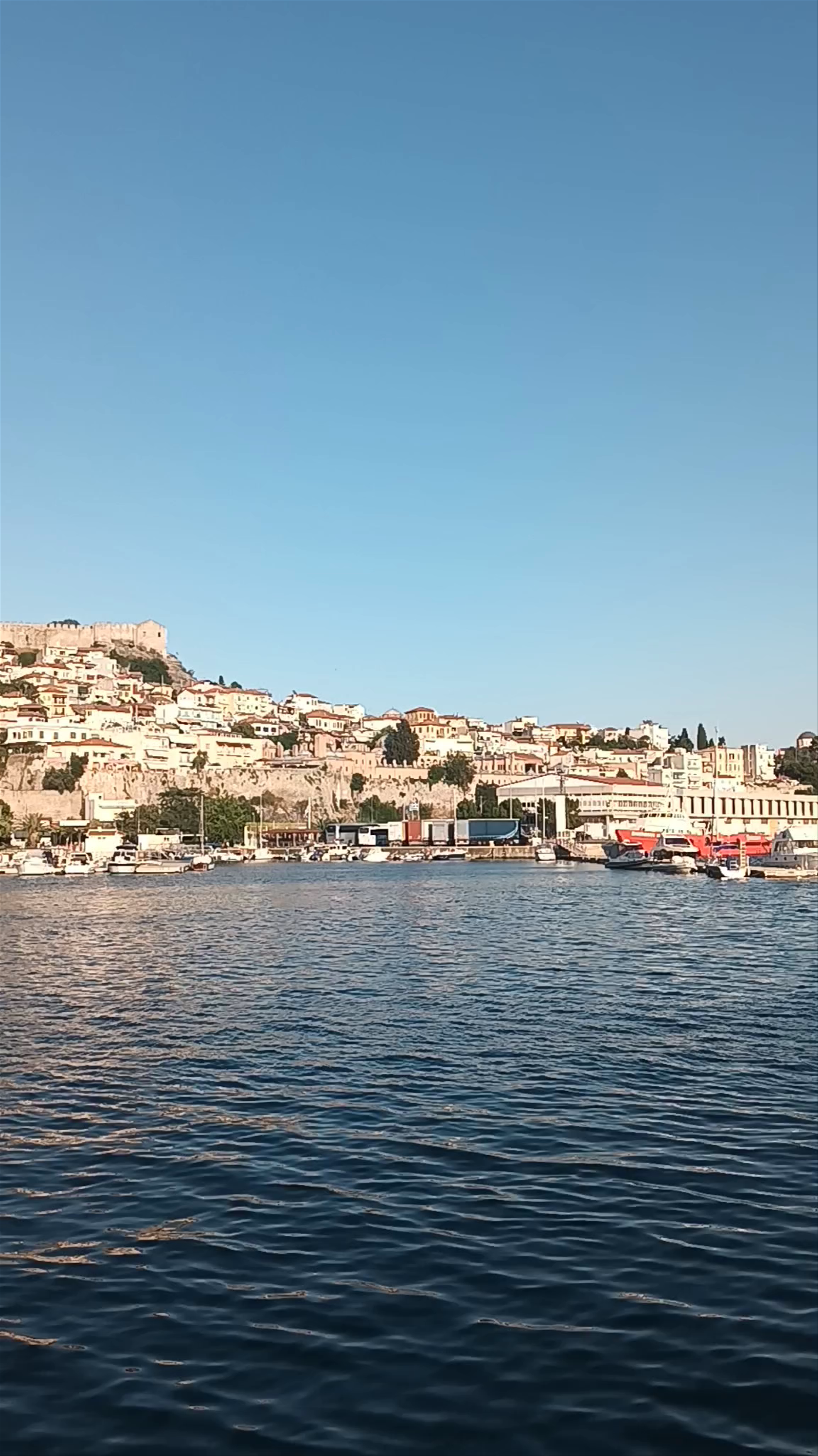 Sunset Over Kavala Harbor: A Mediterranean Coastal Escape