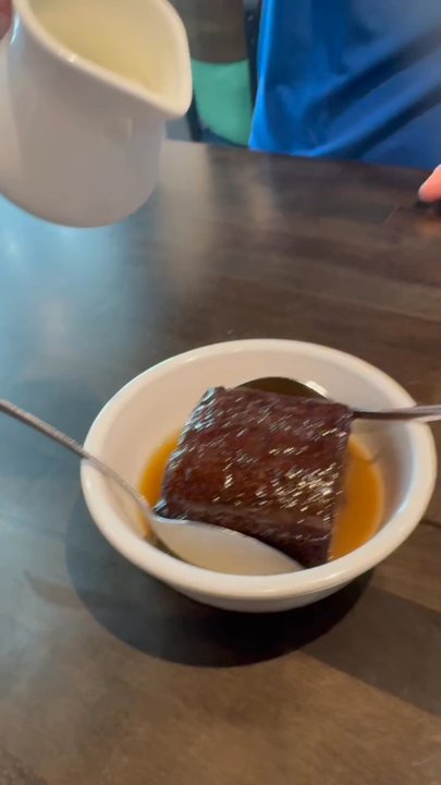 Fish and Chips Houston - Warm heavy cream poured over warm gooey toffee cake - British Near Me - Kemah, Texas