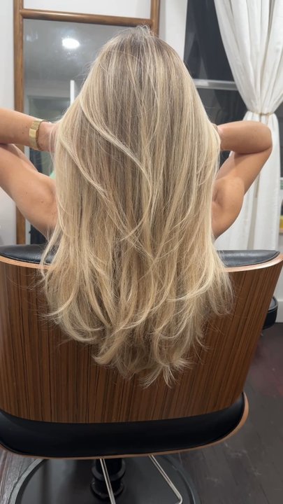 Salon Sovay - Gorgeous babylights/ gently lifted base color for surfer inspired highlights + layered haircut - Hair Salons Near Me - Austin, Texas