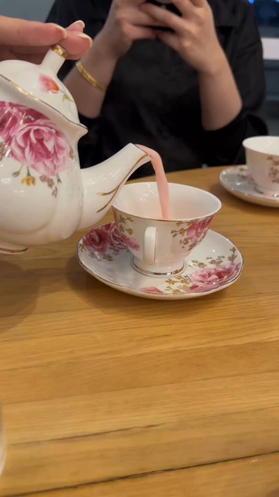 Proper Rose Garden - Tea pot with rose milk tea - Themed Cafes Near Me - Katy, Texas