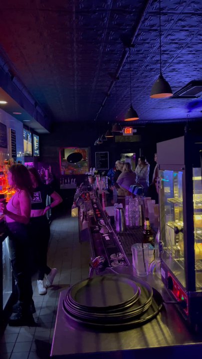 The Box - Beautiful Long Bar with TVs Behind. Great to Watch The Game - Sports Bars Near Me - Iowa City, Iowa