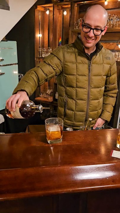 Uncle Tim’s Cocktails - Video of Patrick Stern finishing drink preparation with garnish - Cocktail Bars Near Me - Denver, Colorado
