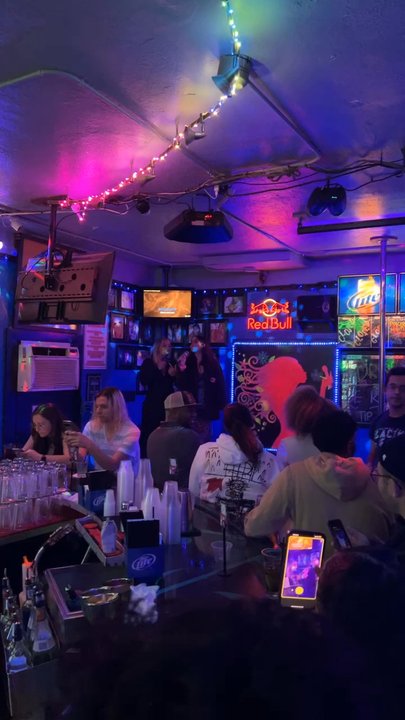Moondogs - My gf and her friend was one of those eager to sing--bless her heart (and my ears) - Sports Bars Near Me - Atlanta, Georgia
