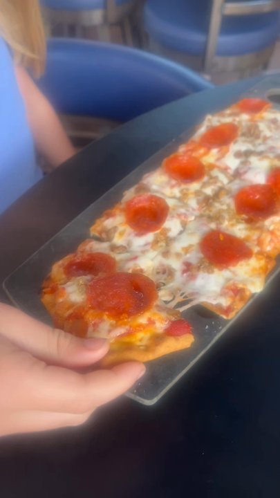 8th Ward Pub - Showing off her lunch - Tapas/Small Plates Near Me - Rockford, Illinois