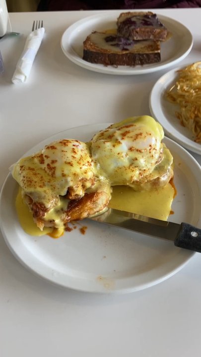 Oasis Cafe - Eggs Benedict (Nashville Hot Chicken), Hashbrown, & Banana Bread French Toast. - Breakfast & Brunch Near Me - Stillwater, Minnesota
