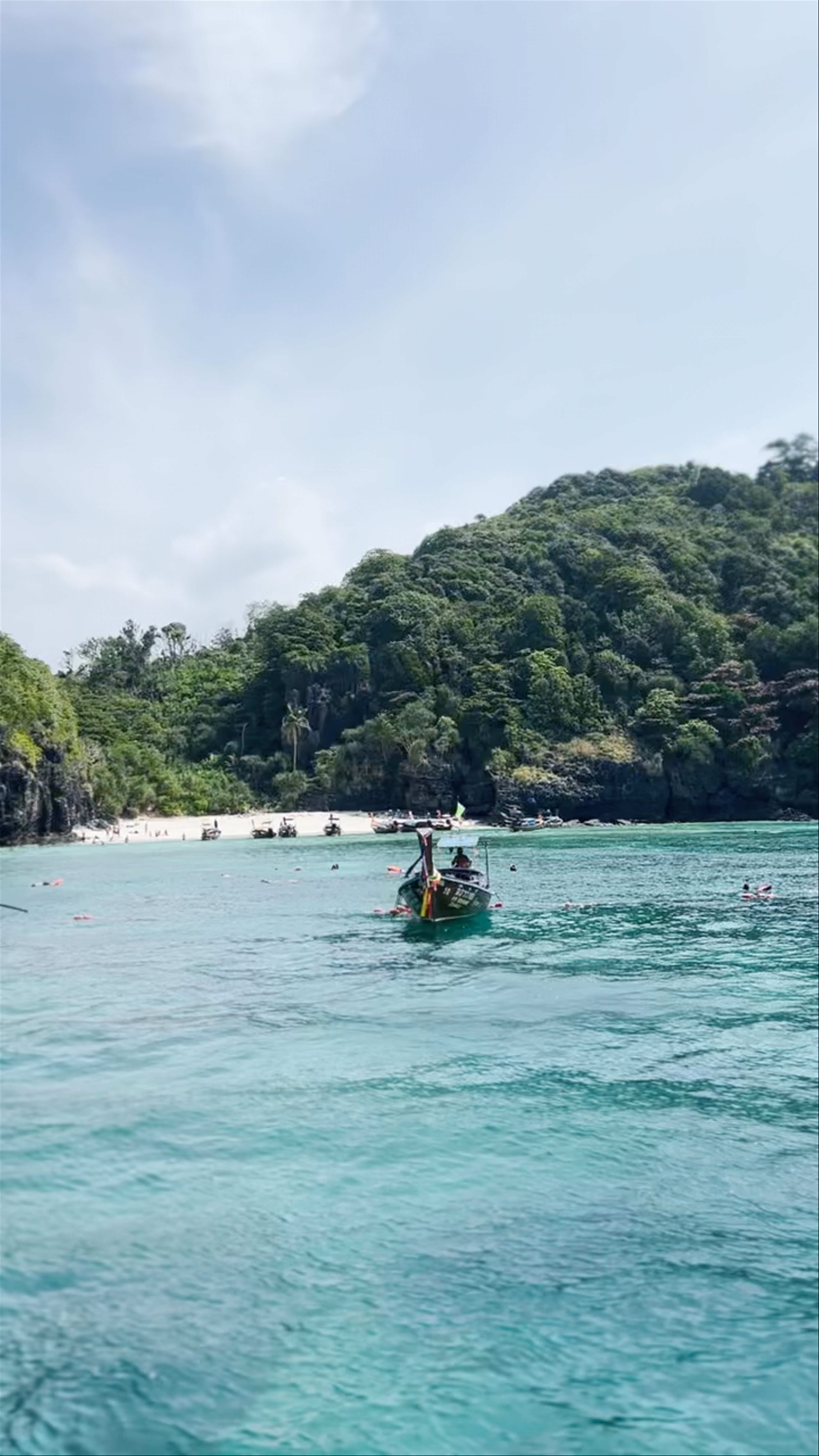 Enchanting Phi Phi Islands: Turquoise Waters and Majestic Cliffs in Krabi, Thailand