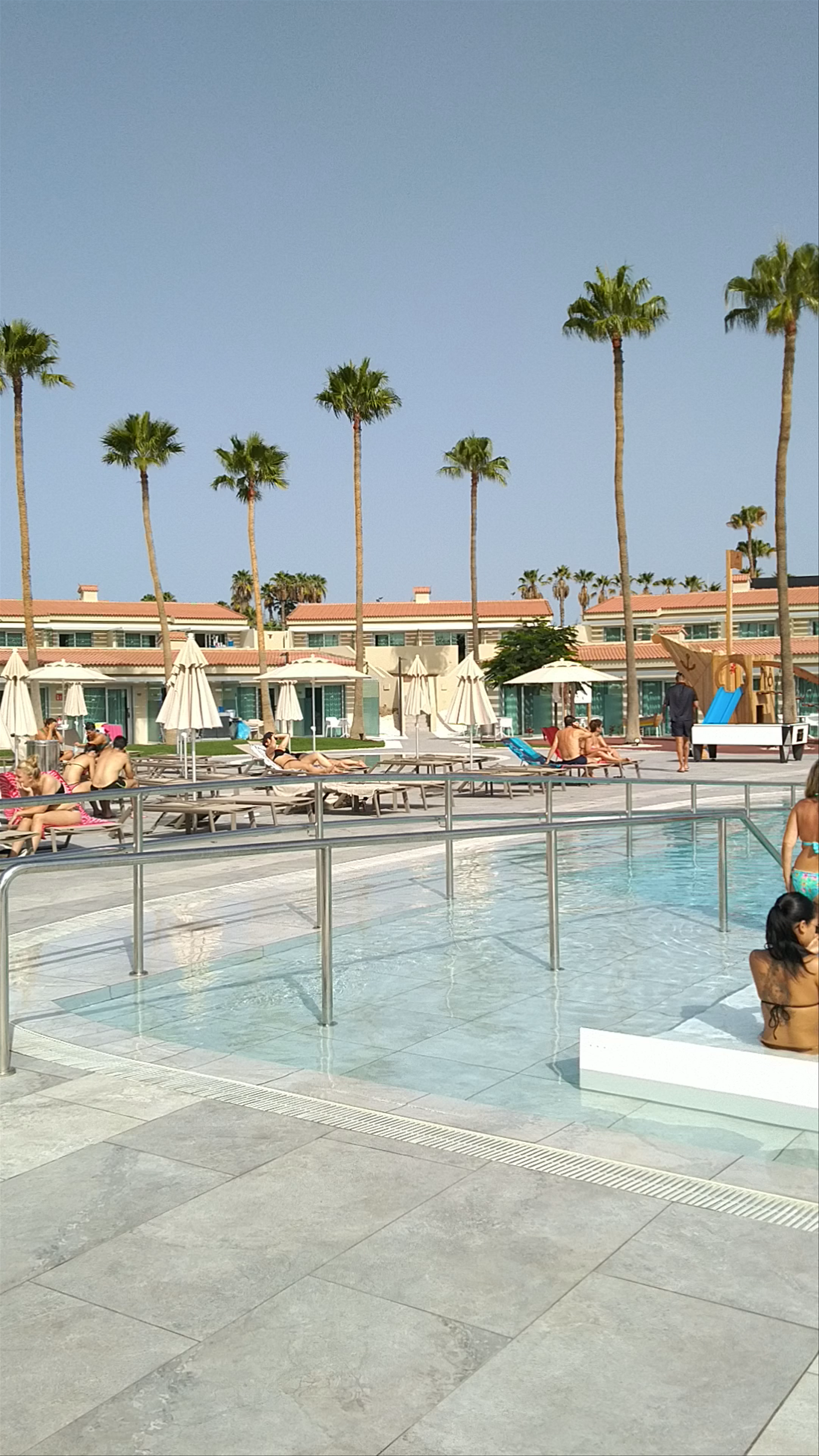Sunny Poolside Relaxation at Kumara Serenoa Hotel, Maspalomas