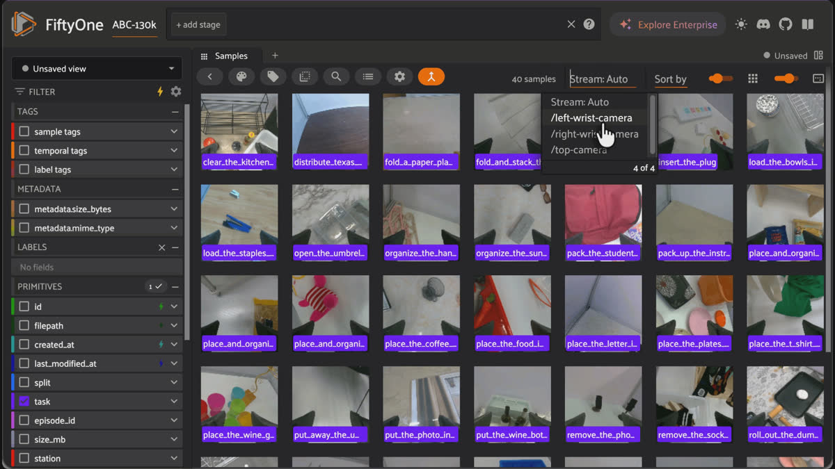 Browsing MCAP episodes in the FiftyOne App grid with task labels, switching the previewed stream between the top and wrist cameras.