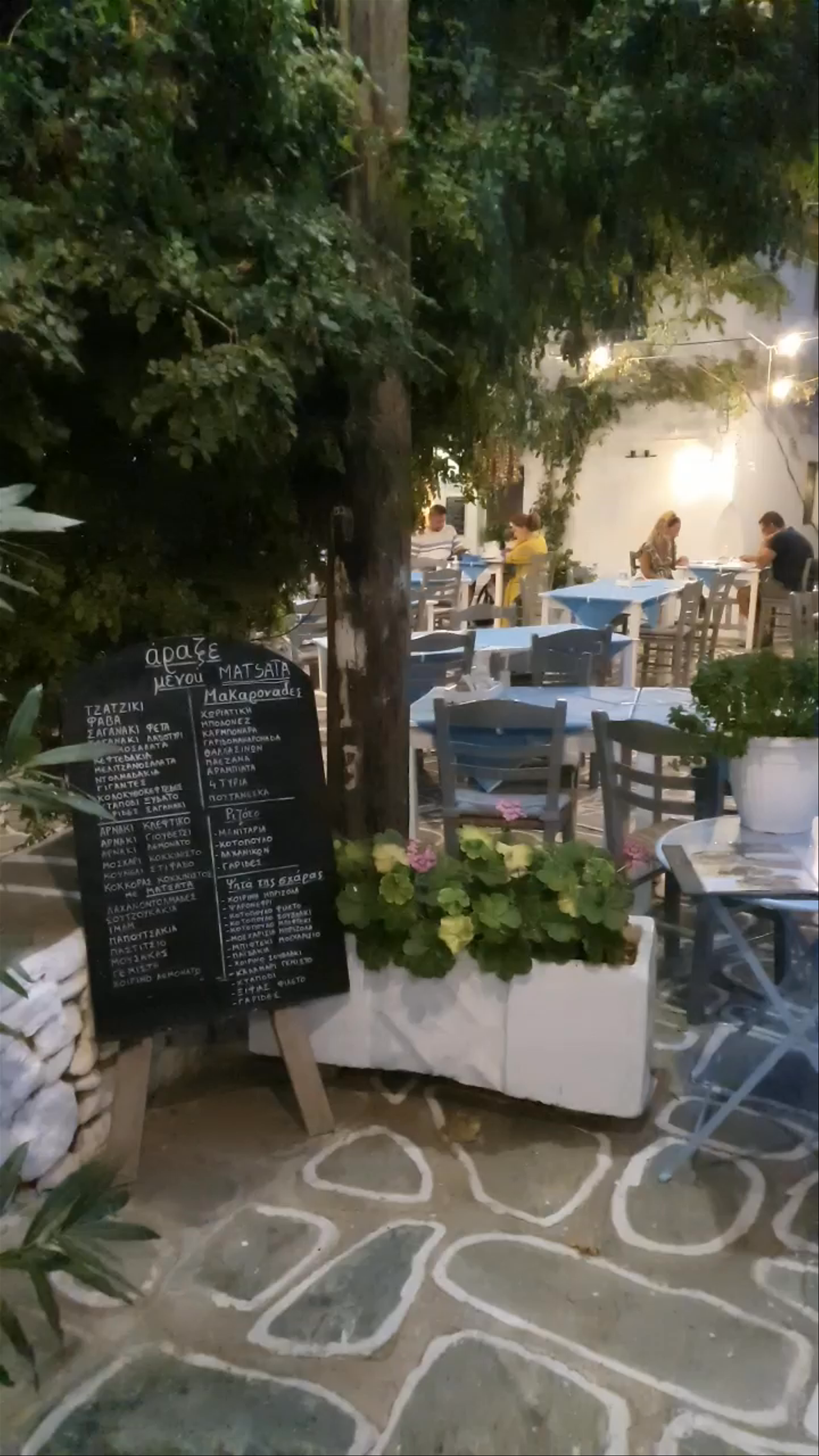 Evening Ambiance at a Charming Greek Taverna in Folegandros