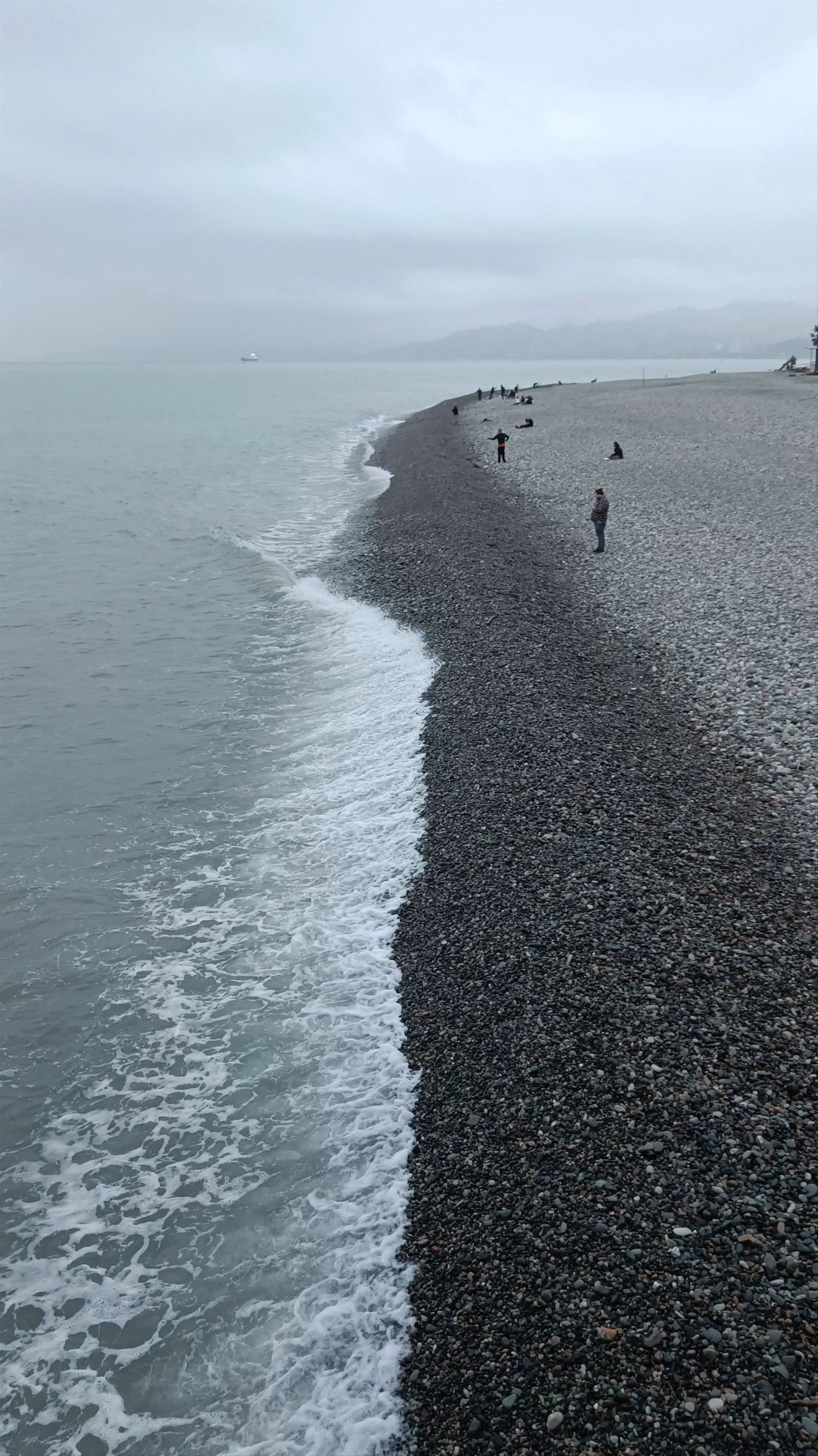 Serene Evening at Batumi Seafront Promenade and Pebble Beach
