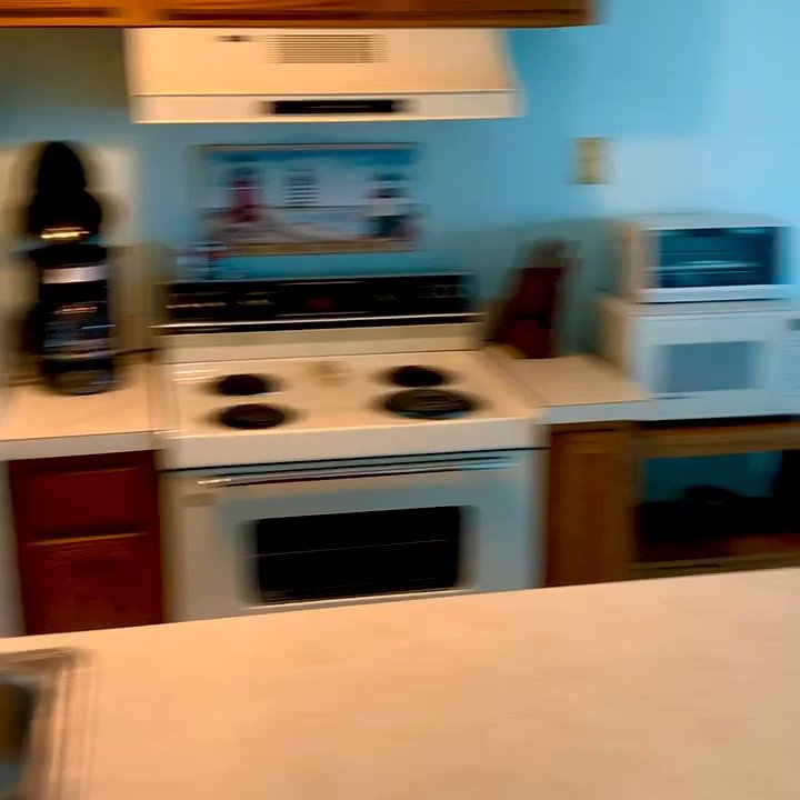 Waterfront Condominium - Unit 240 E. Quick tour of kitchen, living room, sun room, and view. Bedroom and bathroom not shown. #UpCloseSavor XP - Condominiums Near Me - Port Clinton, Ohio