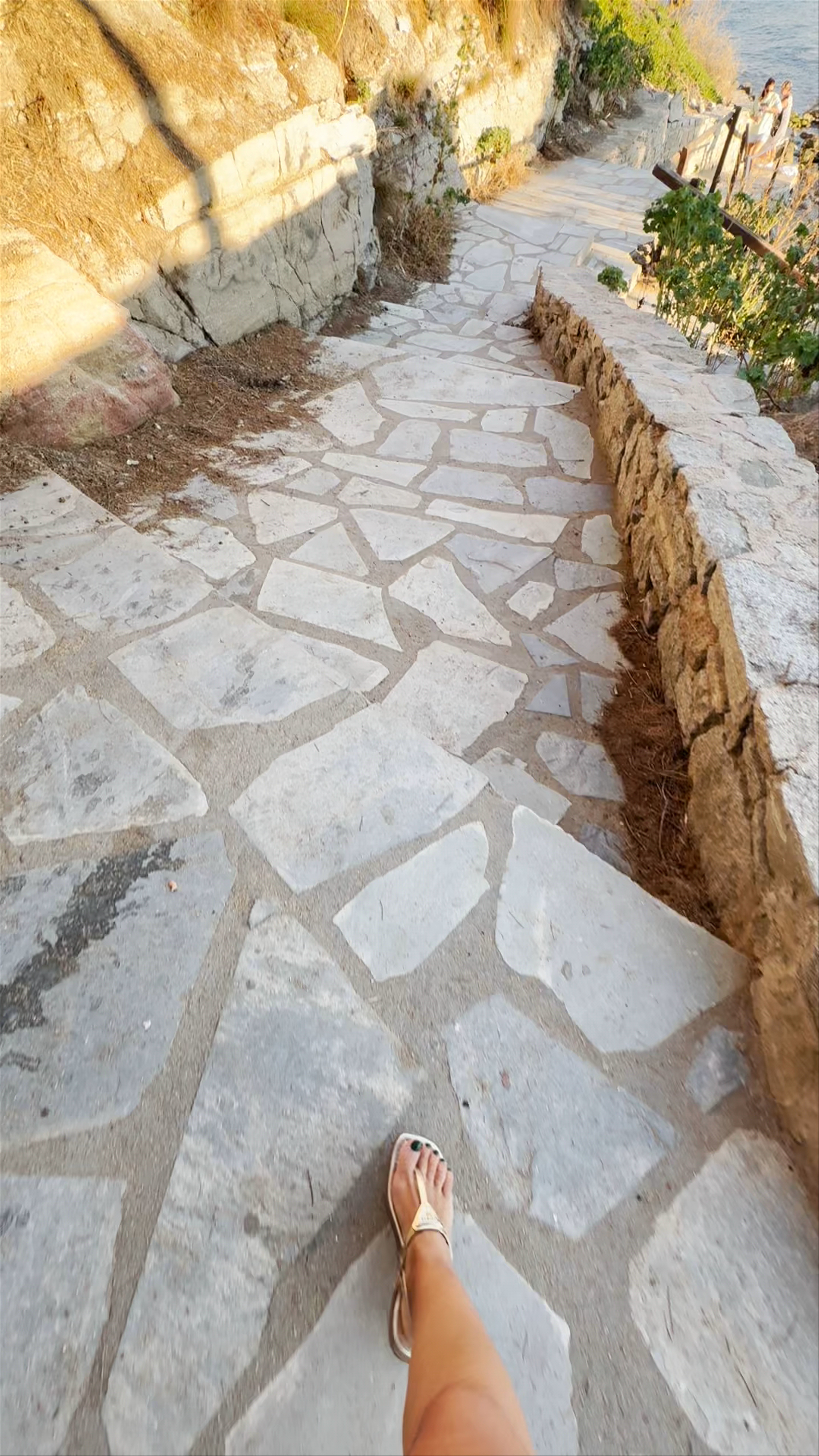 Sun-Kissed Stroll Along Agios Haralampis Beach Path, Mykonos
