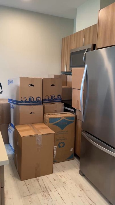 Ondemand Movers USA - Boxes stacked neatly and bed frame assembled. - Movers Near Me - Chicago, Illinois