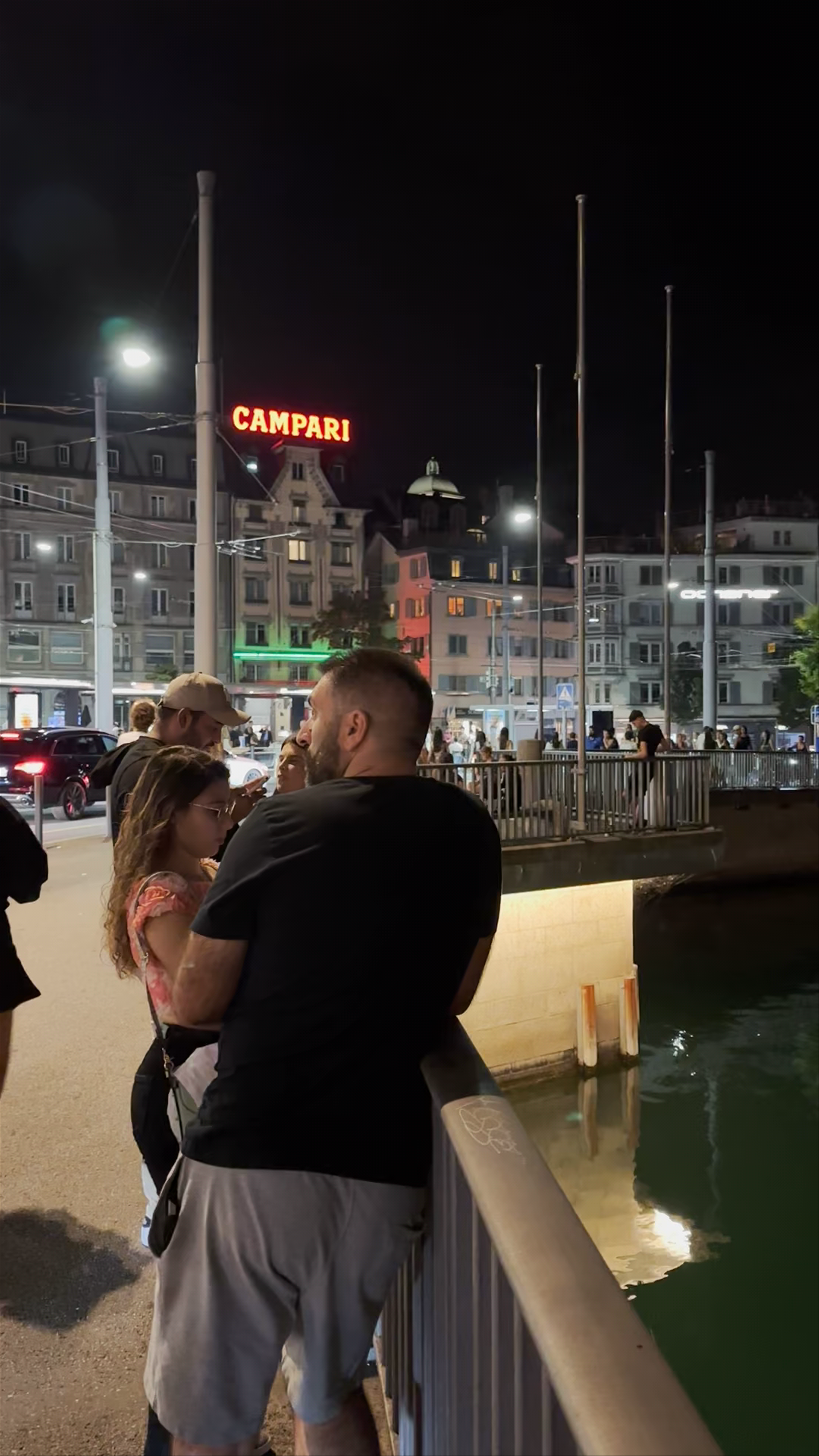 Nightlife at Bahnhofbrücke in Zürich: Vibrant Urban Riverside Atmosphere