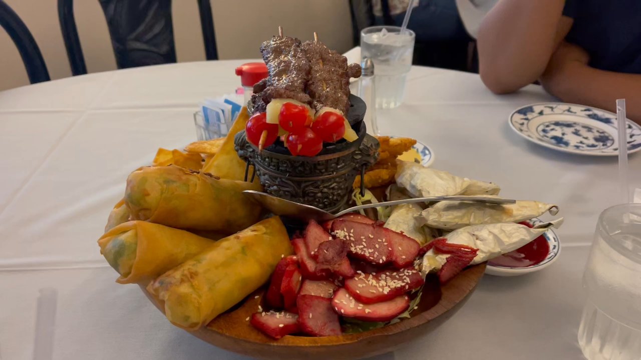 Peter Chu's Skyroom - Poopoo platter includes chicken in foil wrap, spring rolls, kabob, bbq pork, tempura shrimp, and fried wontons - Chinese Near Me - Redding, California