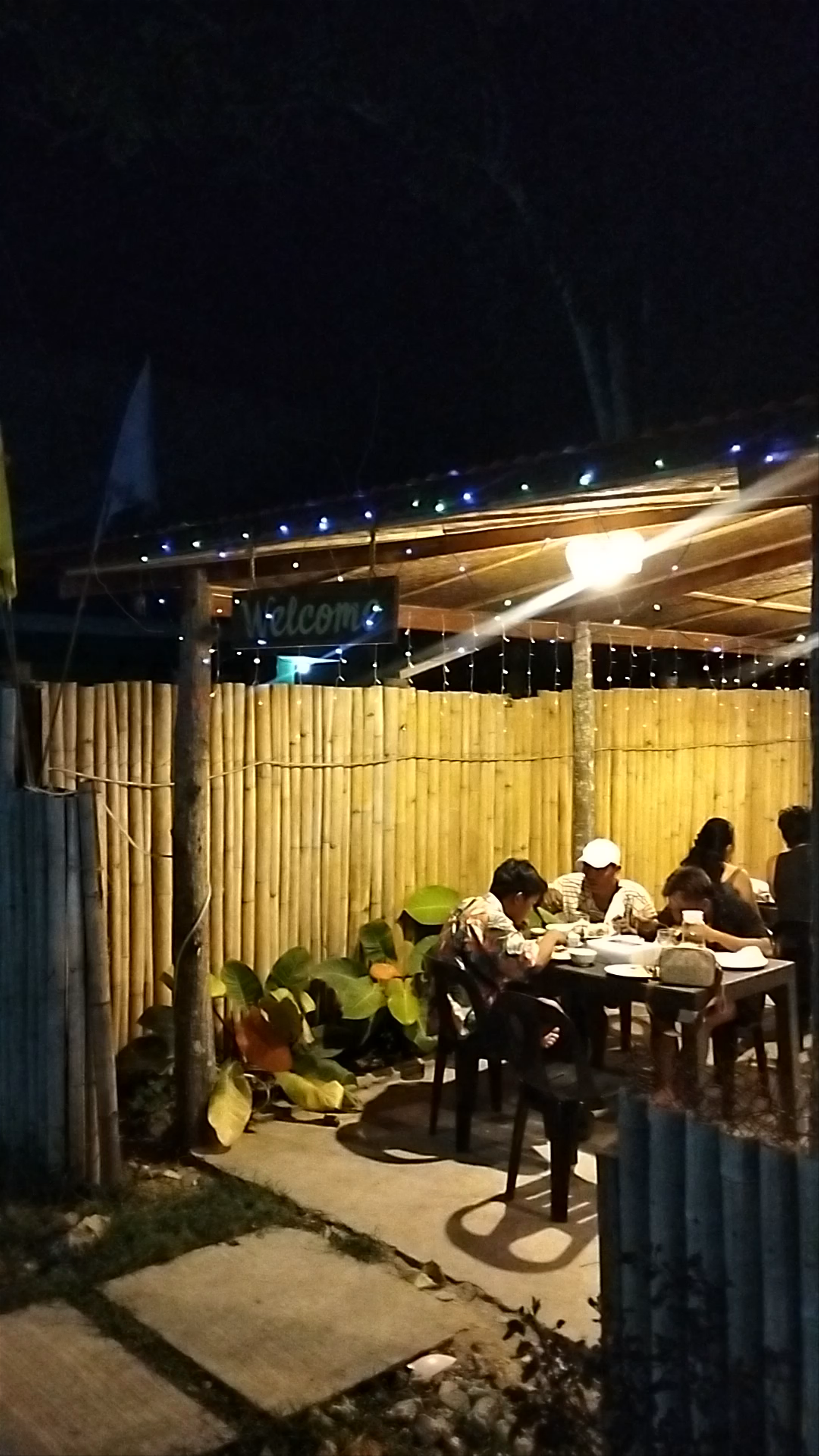 Roadside Diners at Night in San Juan, Siquijor, Philippines