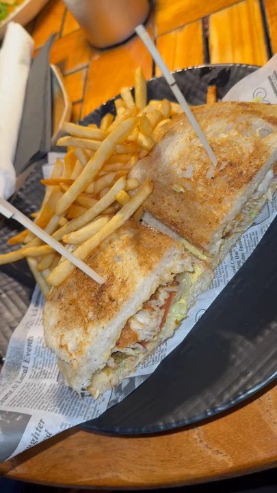 Zoe’s Beachside Grill - Blackened mahi mahi sandwich and fries. 10/10 !!! So delicious. Obsessed - Mediterranean Near Me - Pompano Beach, Florida