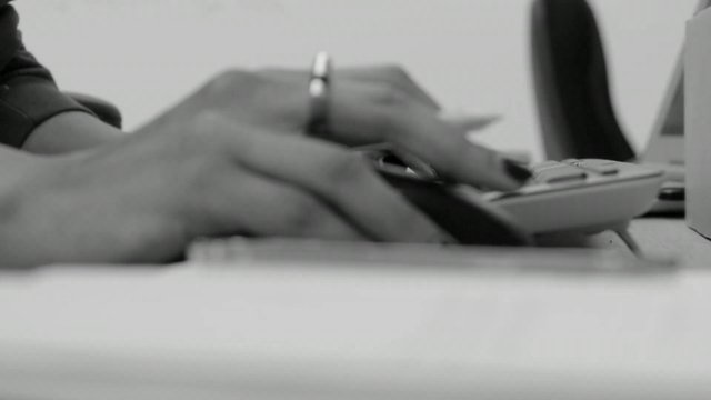 Woman browsing on a laptop