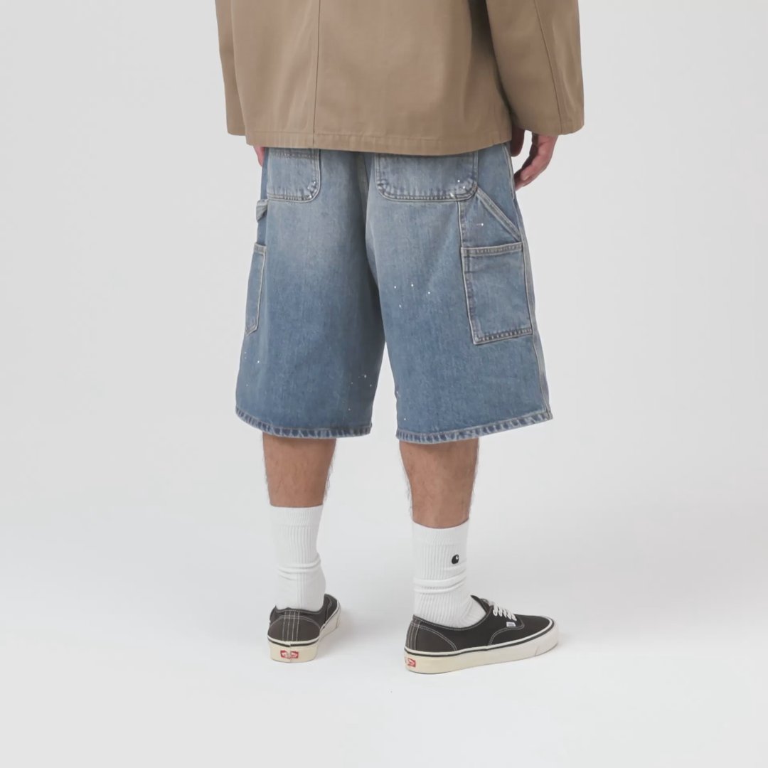 Model wearing a pair of OG Single Knee Shorts