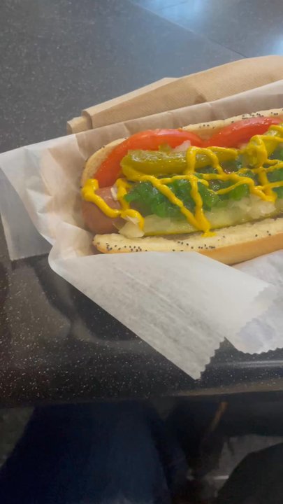 Rush Street Bar - Showing the Chicago dog - Airport Lounges Near Me - Chicago, Illinois
