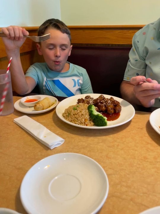 Ma Ma Wok - His face says it all!  Sesame Veg. Meat is our favorite dish here. - Chinese Near Me - Charlotte, North Carolina