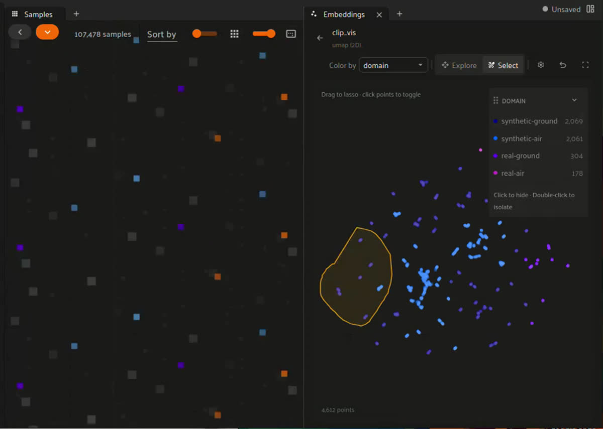Exploring the embeddings panel to find a real aerial clip whose grassy terrain resembles the synthetic ground clips surrounding it.