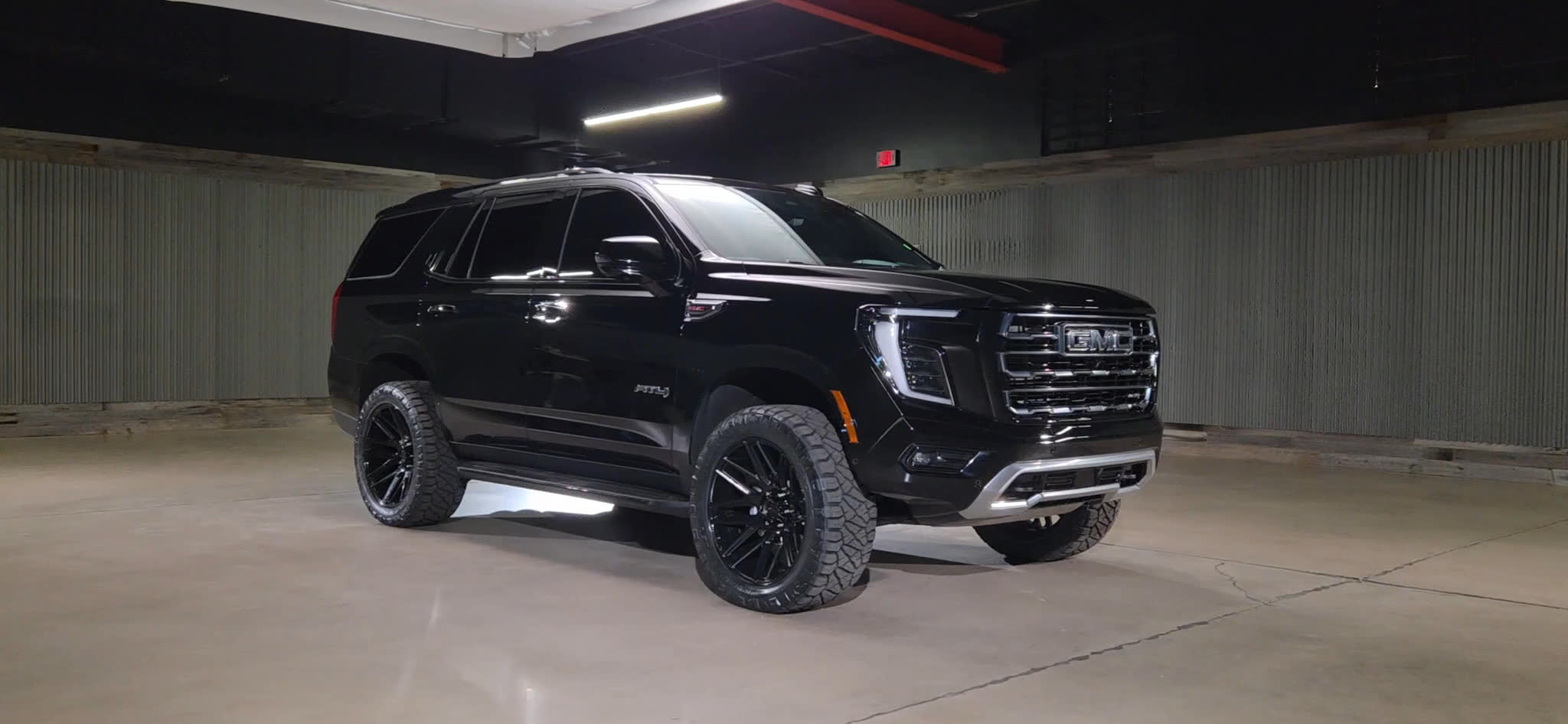 Lifted Trucks - #T33499A - 2025 GMC Yukon AT4