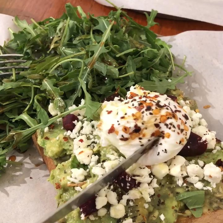 ARS Cafe - Avocado toast with poached eggs and a yummy arugula salad - Art Galleries Near Me - Honolulu, Hawaii