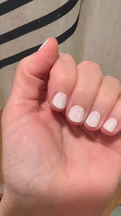 NK Nails - $30 regular (no shellac) manicure. Leftover shellac from previous mani showing thru... bubbles in the polish - Nail Salons Near Me - Seattle, Washington