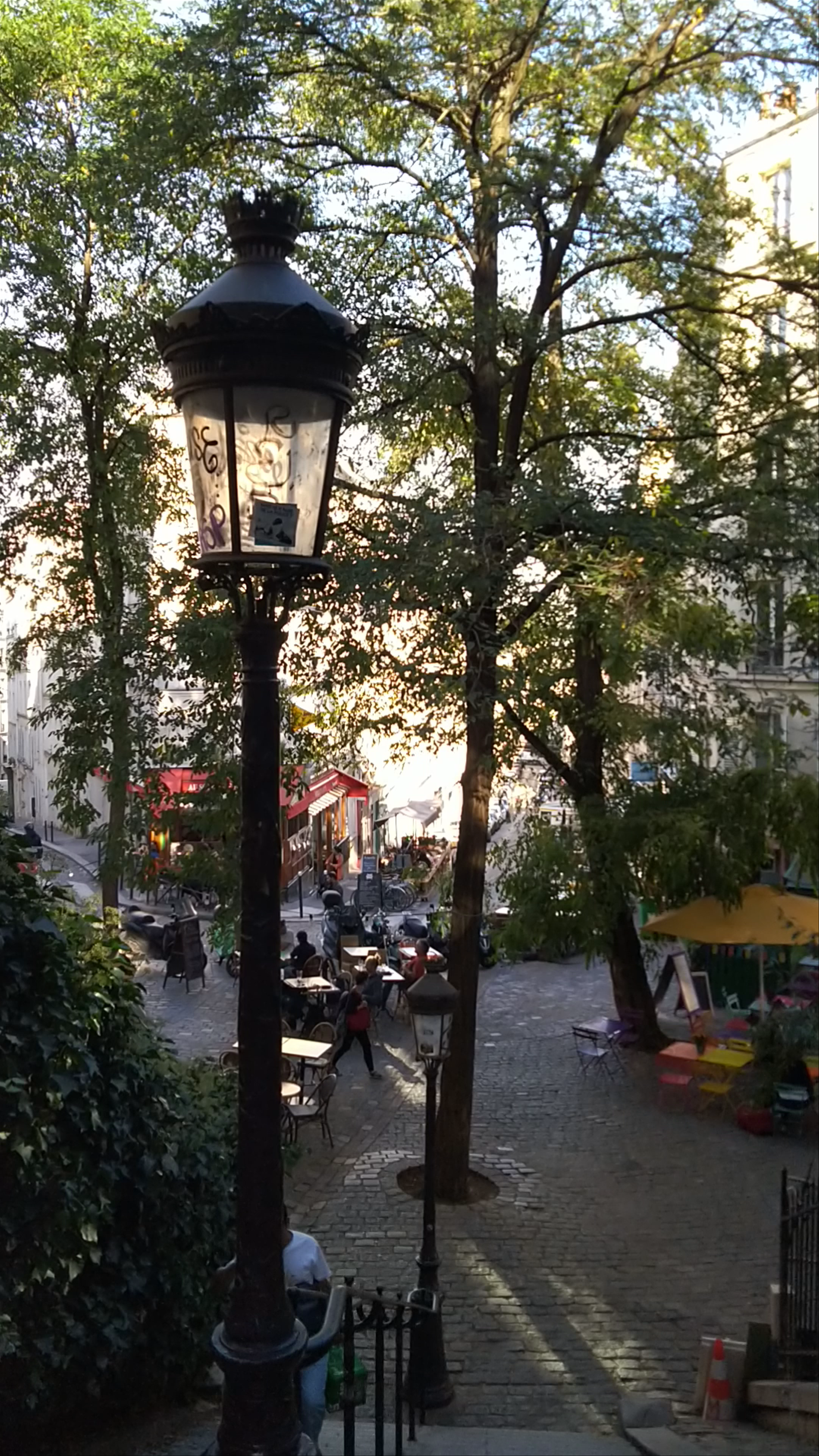 Charming Parisian Street Café Scene in Autumn Light
