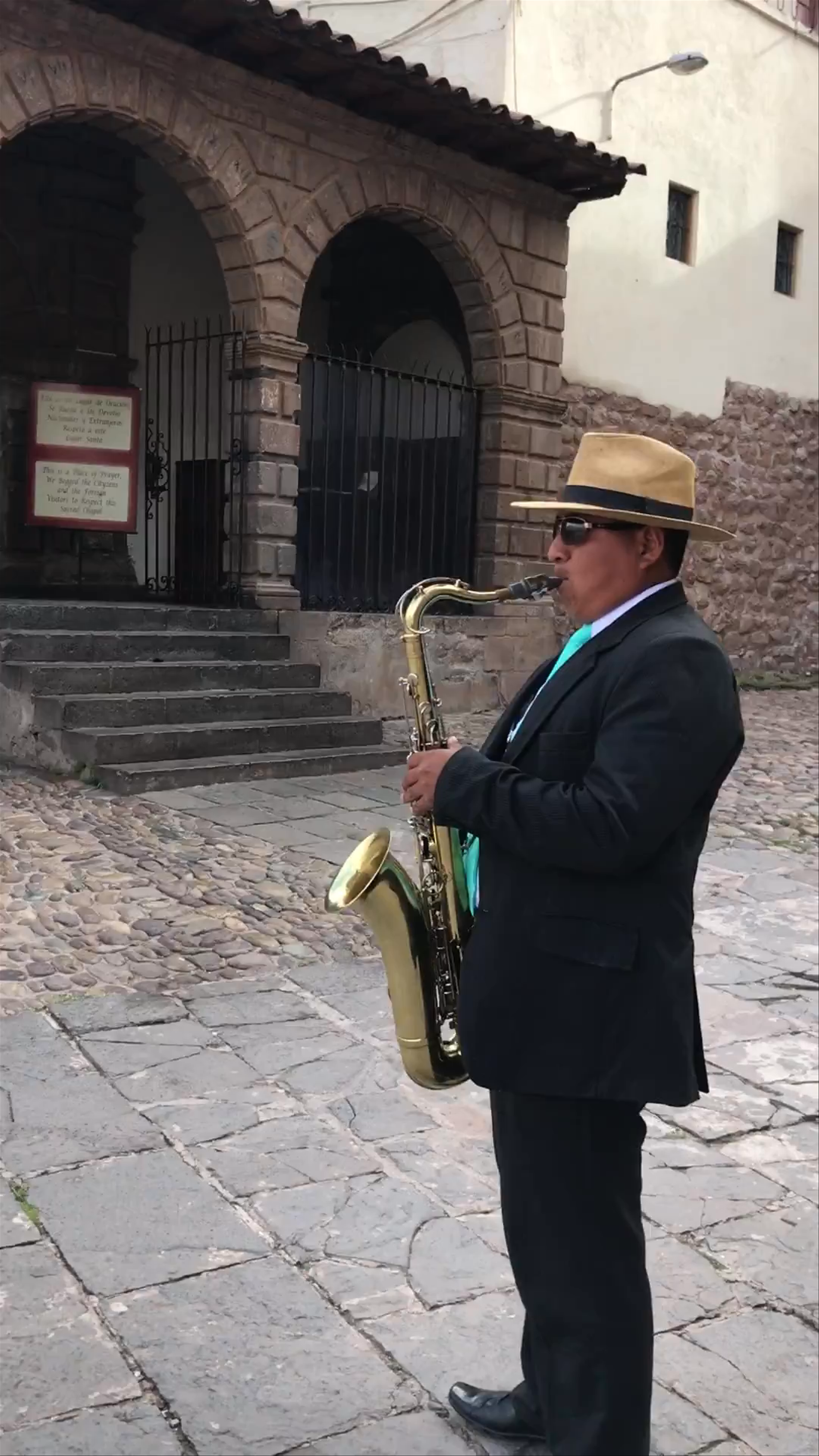 Soulful Saxophone Melodies at Plaza De Armas, Cusco
