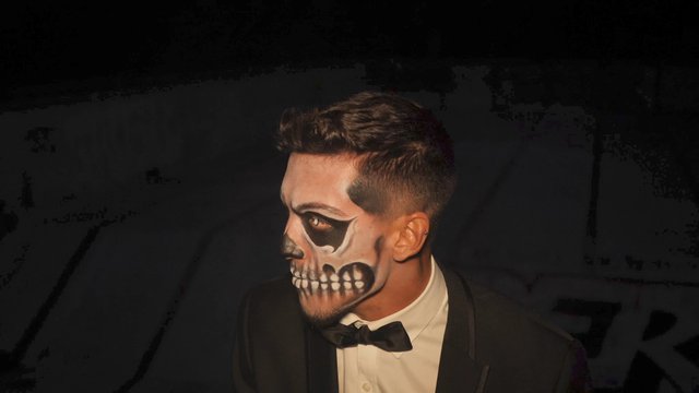 Scary man with skeleton makeup