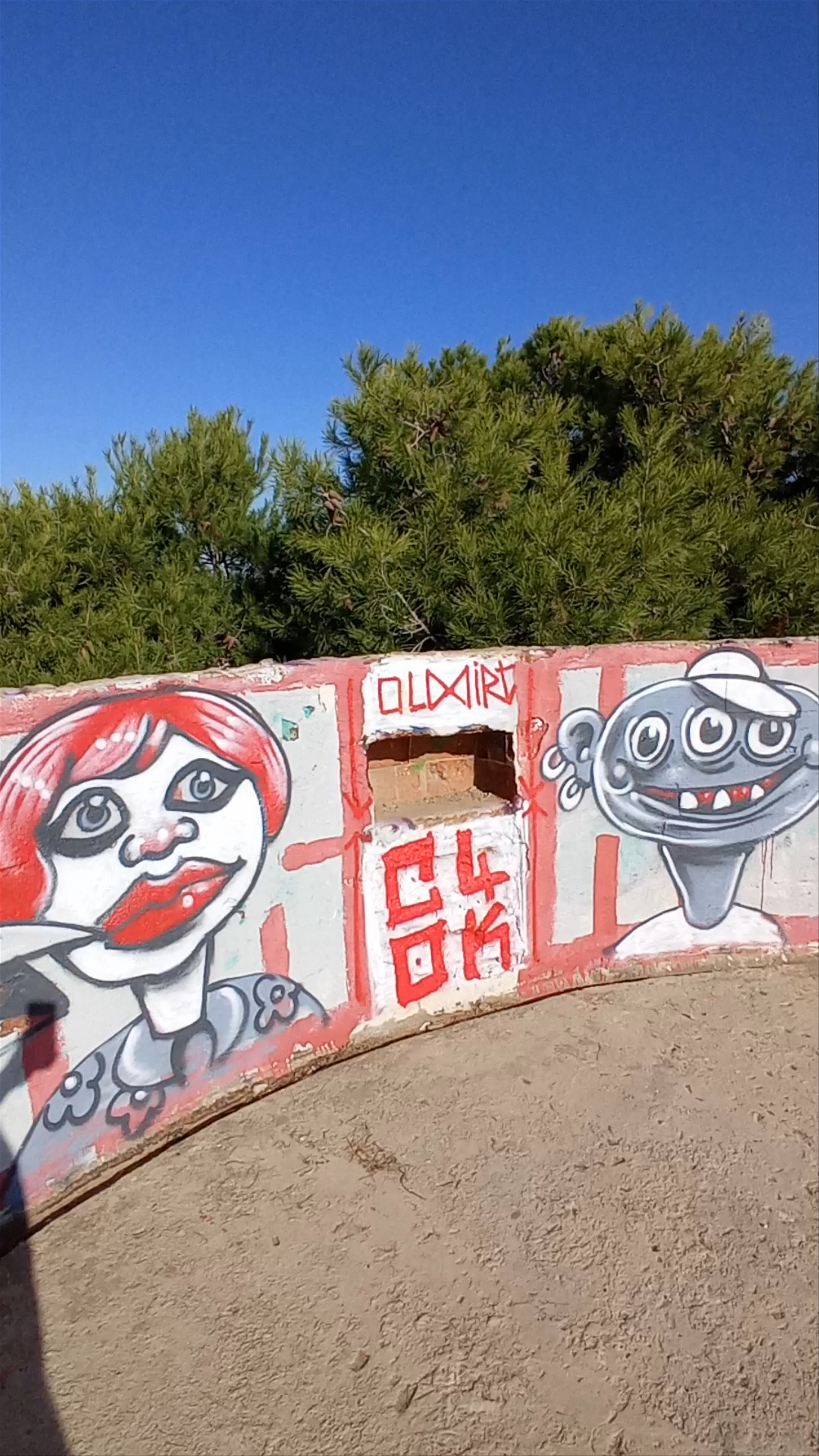 MUHBA Turó de la Rovira: Panoramic Urban Graffiti Views in Barcelona