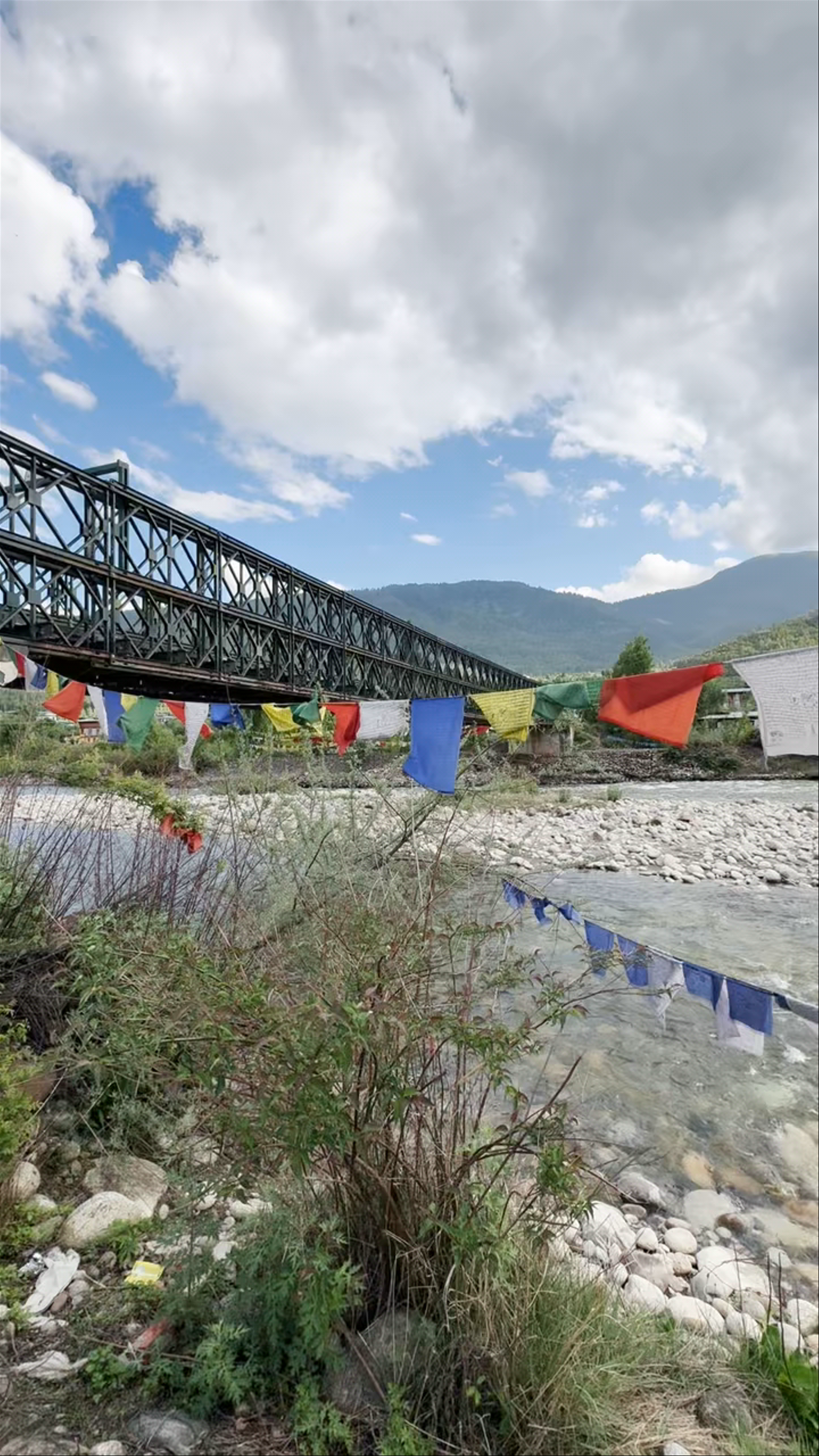 Tshendona Bridge Serenity and Prayer Flags in Paro, Bhutan