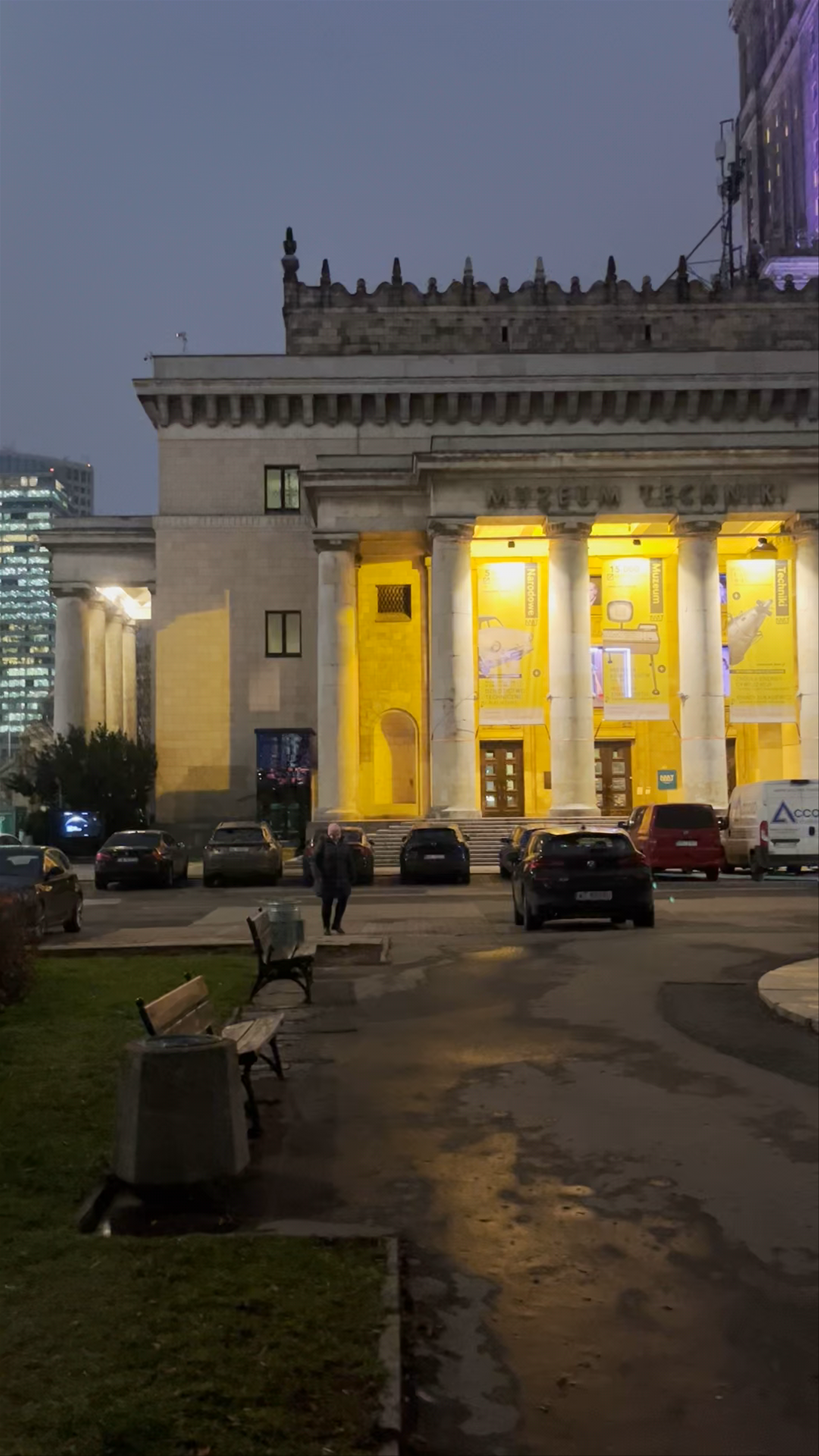 Nighttime at Zegar Kwiatowy and Warsaw's Historic Skyline