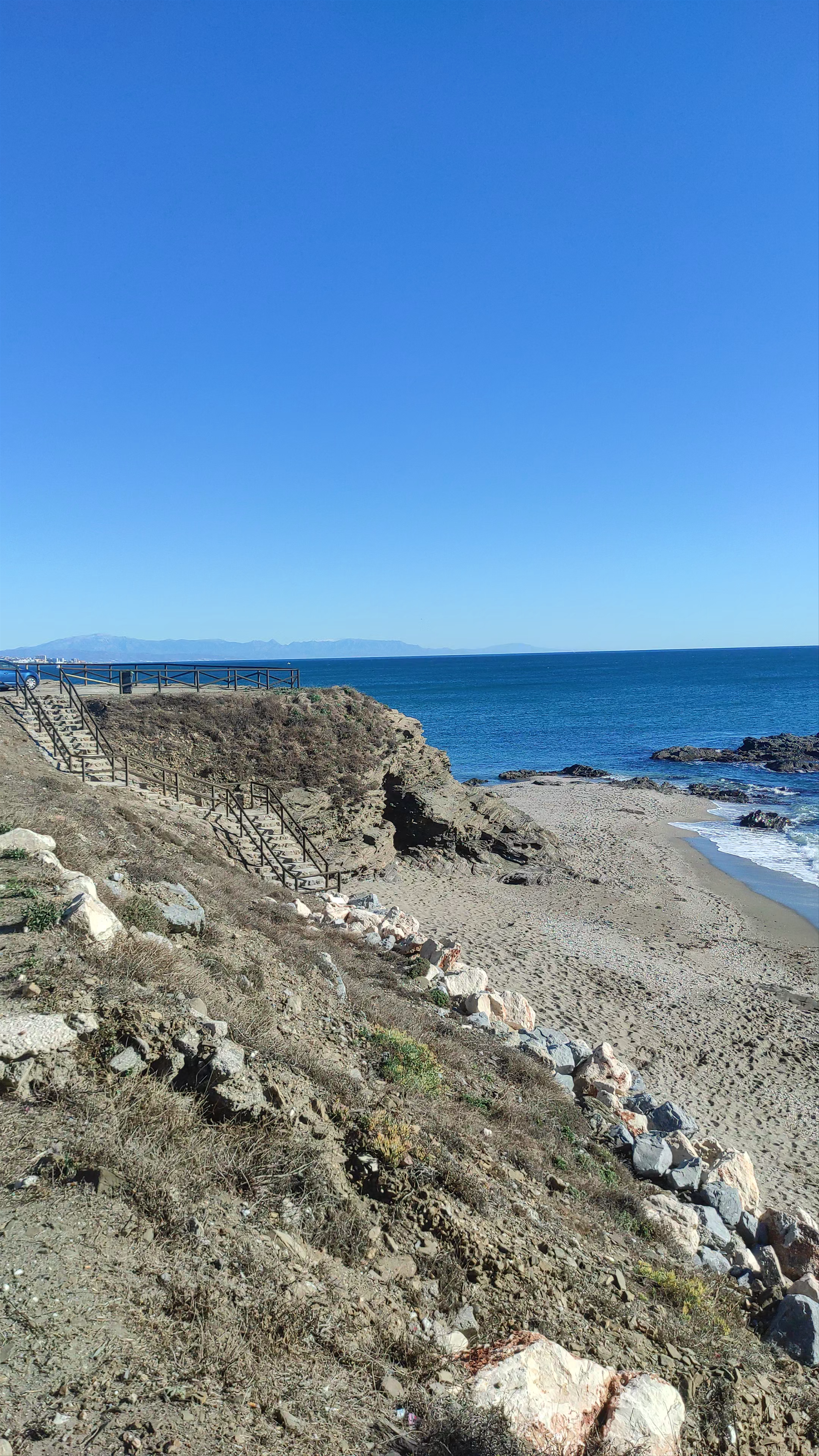 Playa Peñón del Cura: Serene Coastal Escape in Las Lagunas de Mijas