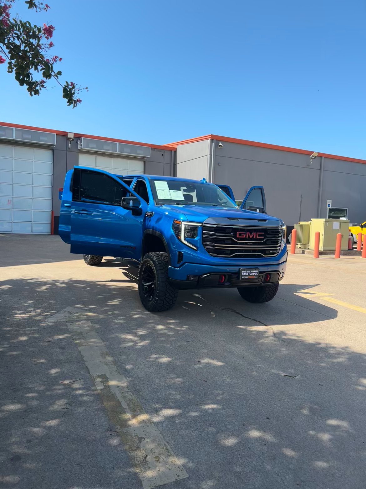 Lifted Trucks - #TX10556 - 2023 GMC Sierra 1500 AT4 Crew Cab