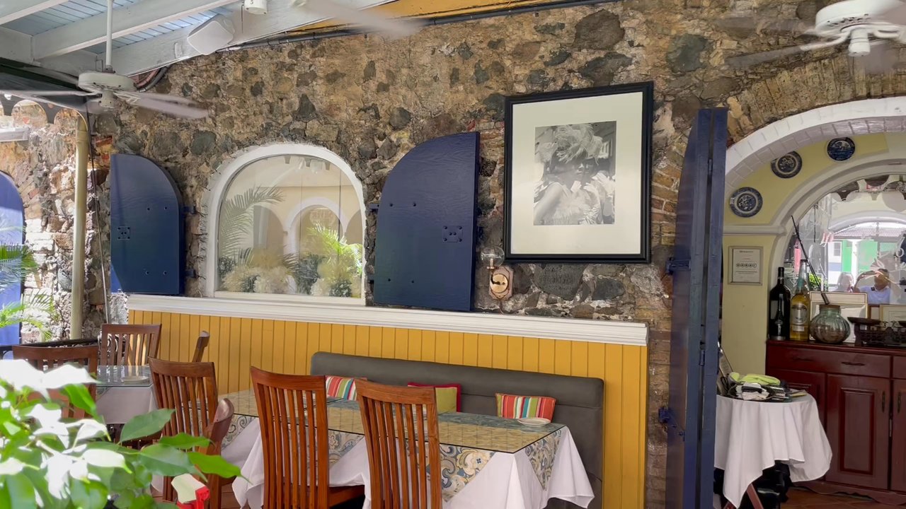Amalia Cafe - Small video of front patio dining options. Amazing decor with cozy ambiance with a Spanish Caribbean flair that is sultry. - Spanish Near Me - St Thomas, Virgin Islands