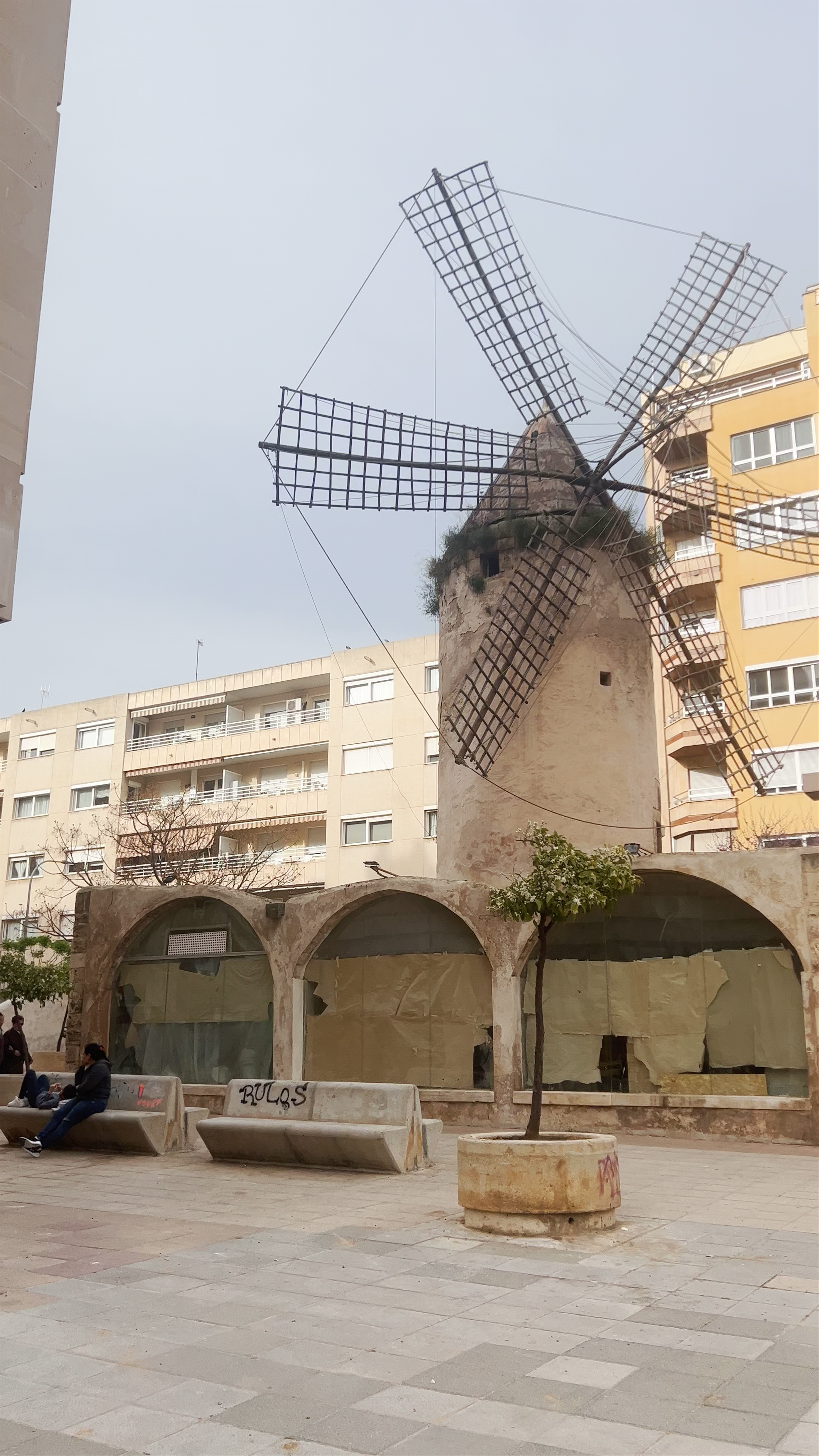 Historic Windmill in Palma: Urban Heritage Meets Modern Life