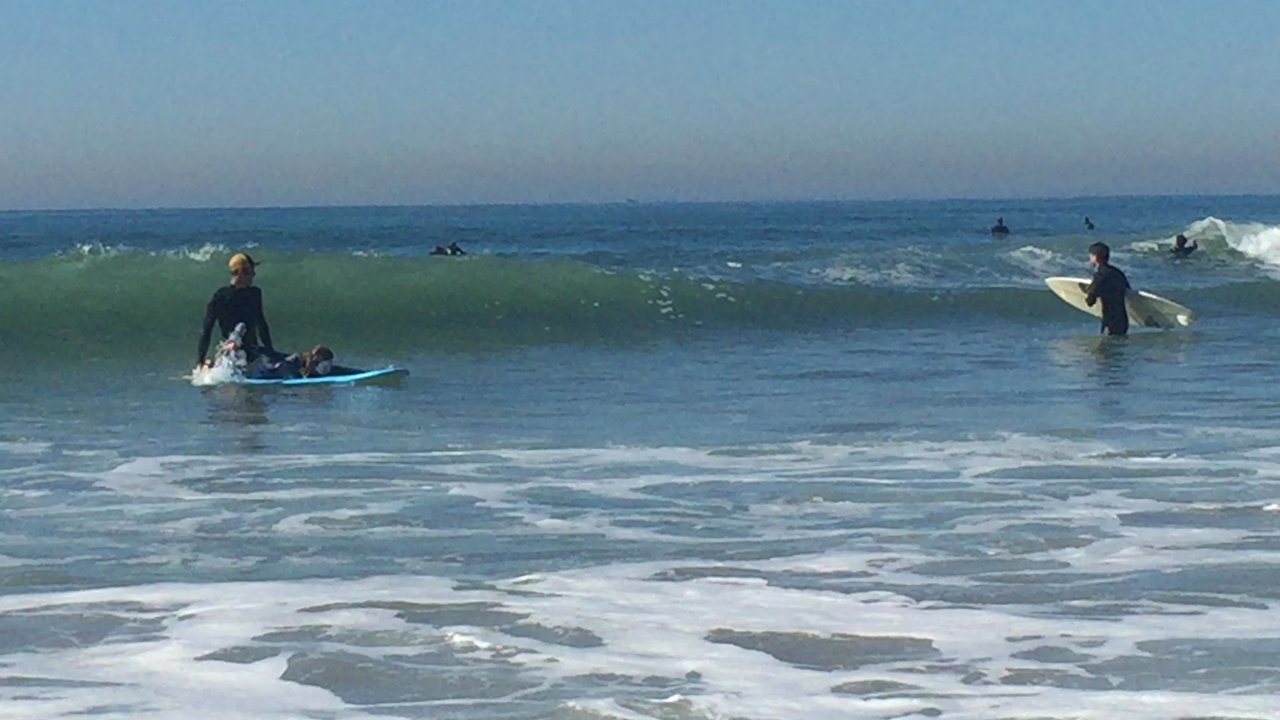 Banzai Surf School - She's just warming up. - Surf Schools Near Me - Huntington Beach, California