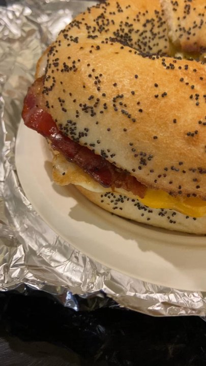 Clint's Bakery and Coffee - Bacon egg and cheese on a poppy seed bagel - Coffee & Tea Near Me - Breckenridge, Colorado